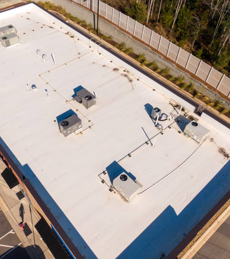 Aerial rooftop with HVAC units and satellite