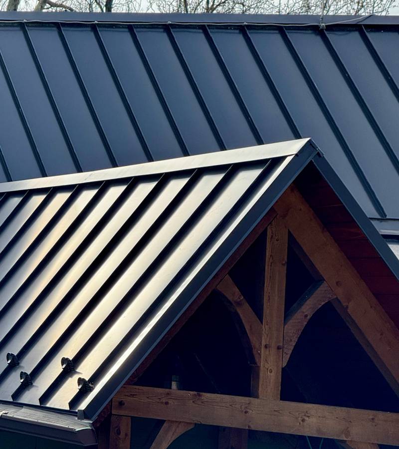 Metal standing seam roof with timber truss