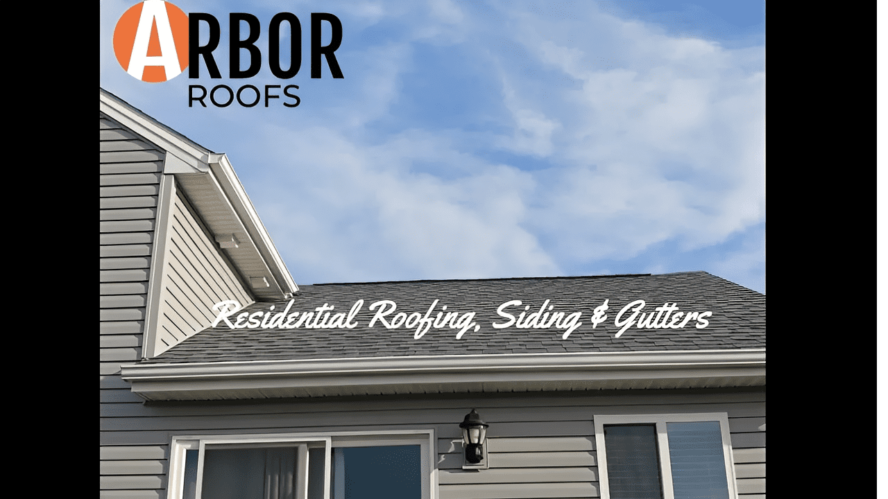 Gray residential roof, siding and gutters