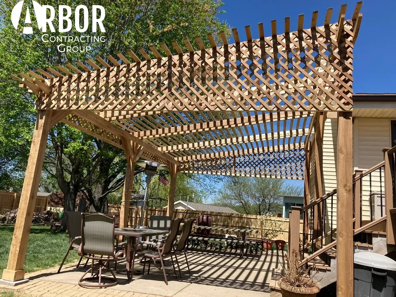 Wooden pergola patio with outdoor dining set