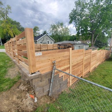 New wooden privacy fence around backyard