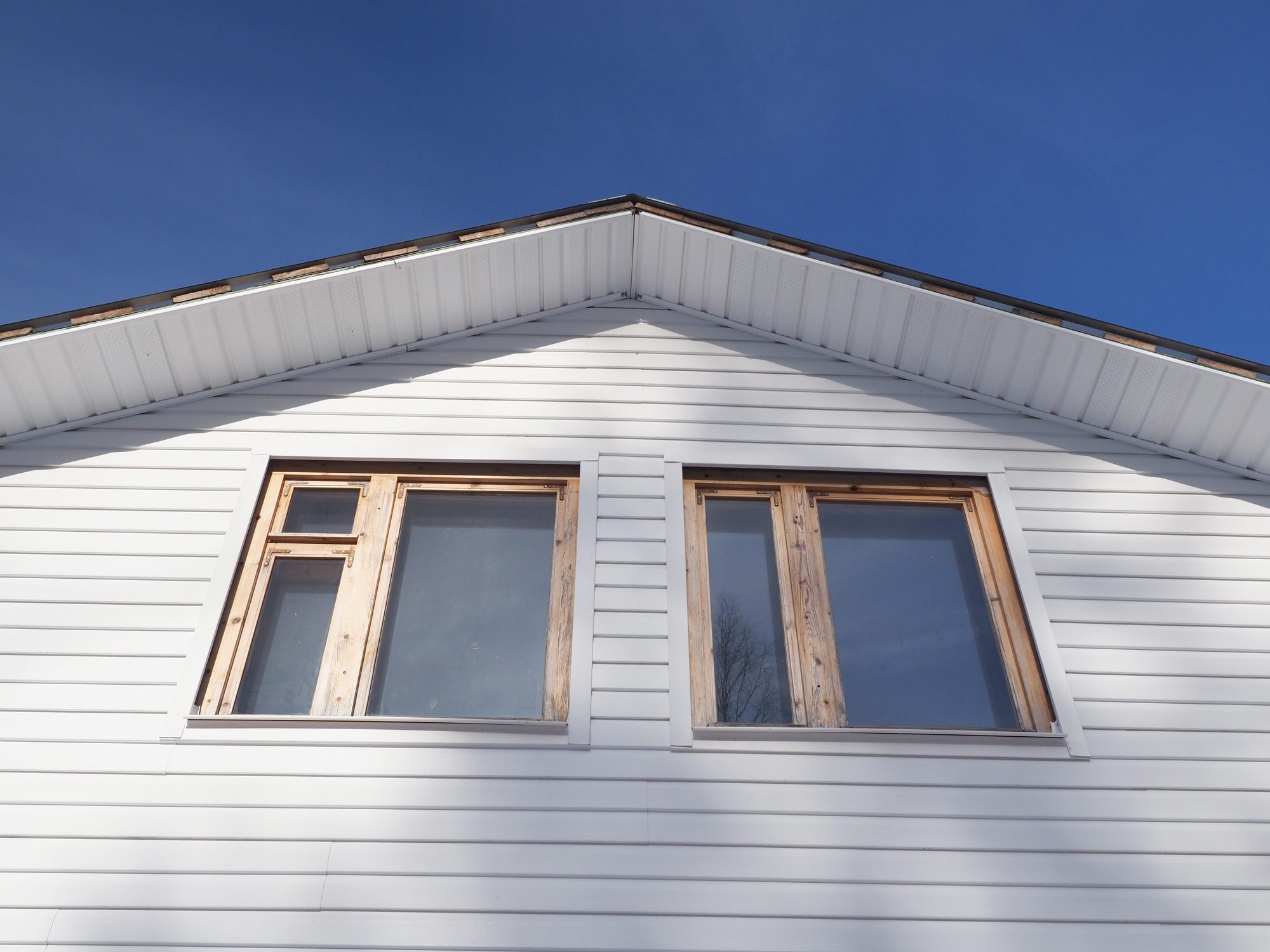 frame house and white siding