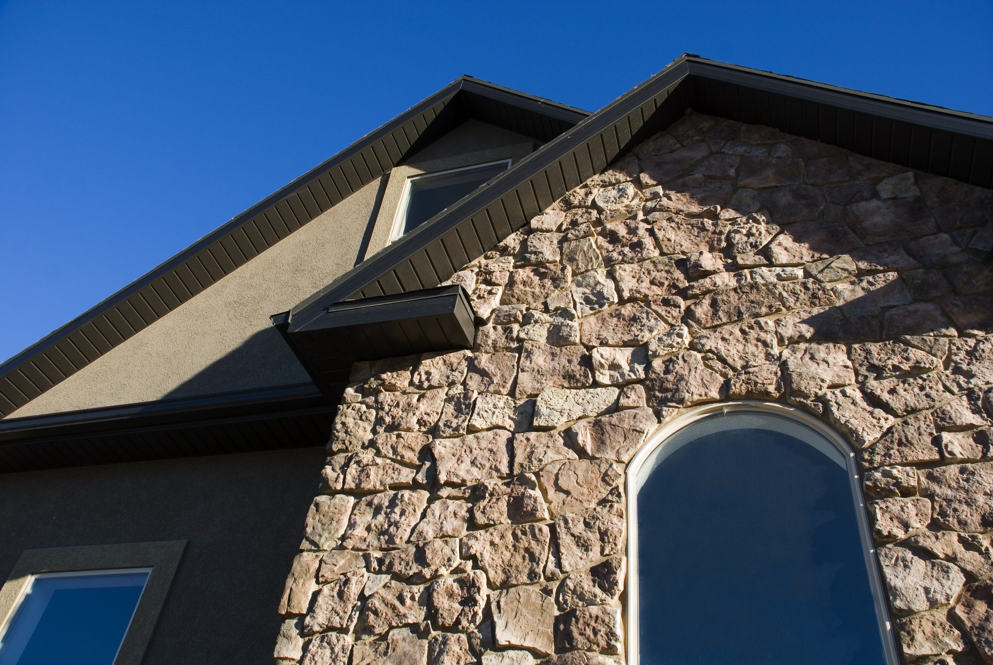 Beautiful exterior of a home with blue sky above