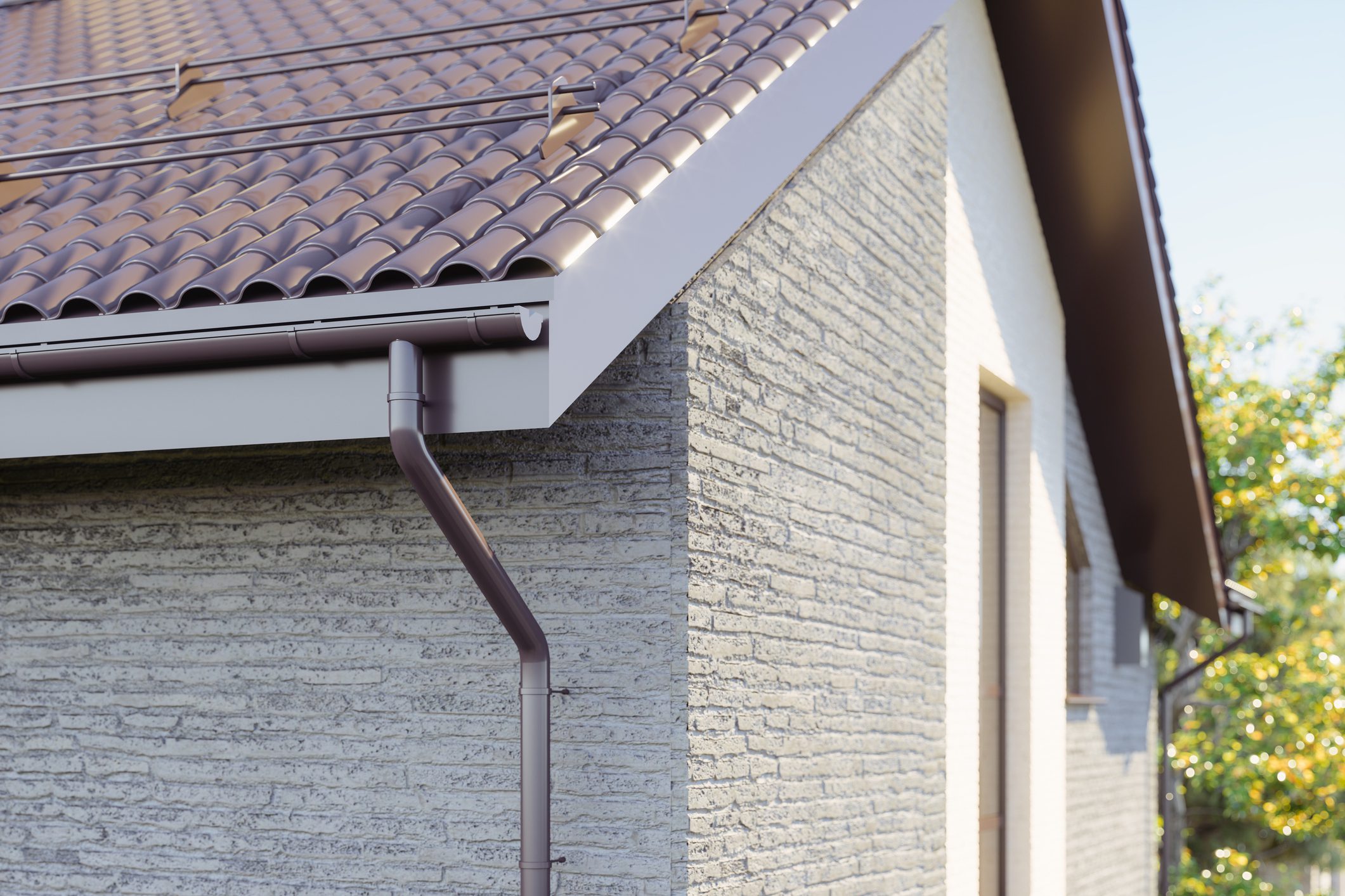 Modern House Roof with Rain Gutter and Downspout System